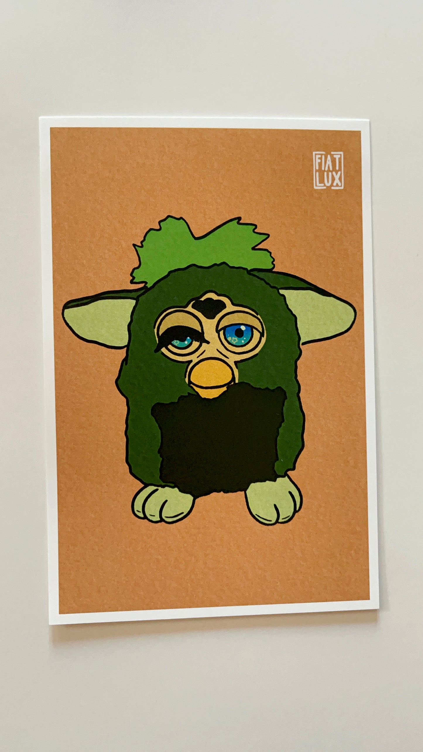 Art print of a furby with a missing eyelash and one eye drooping on a solid soft orange background.