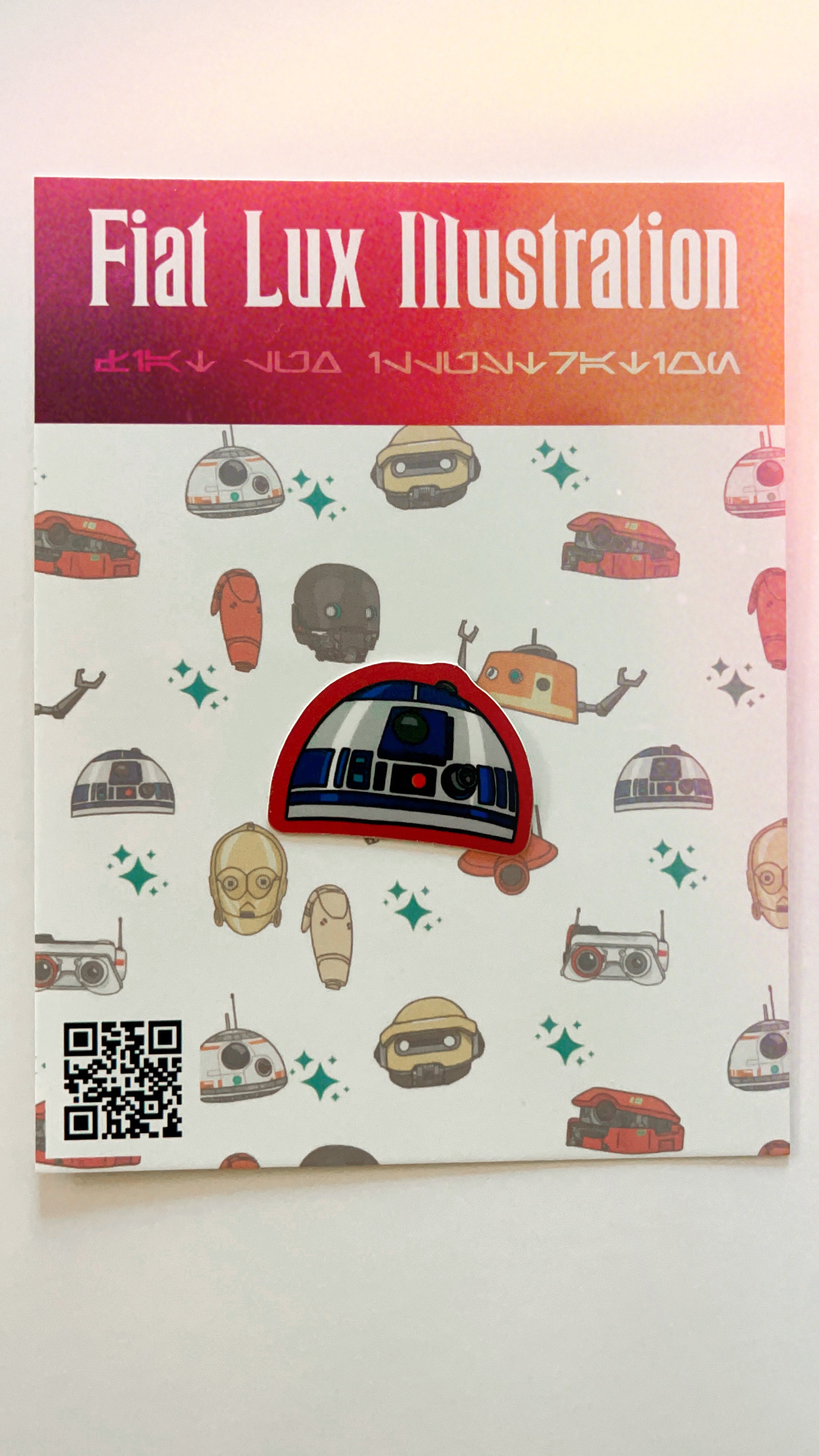 Vinyl sticker of star wars droid r2d2 with red edges.