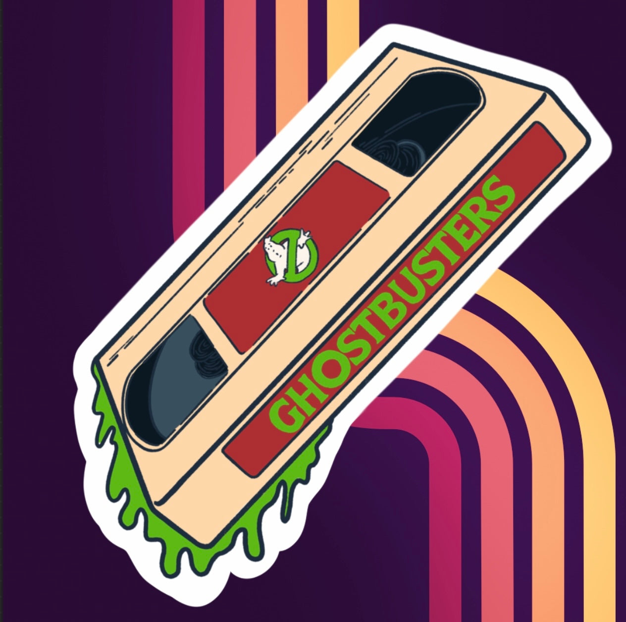 sticker of a beige VHS tape of ghostbusters with green slime in holographic vinyl