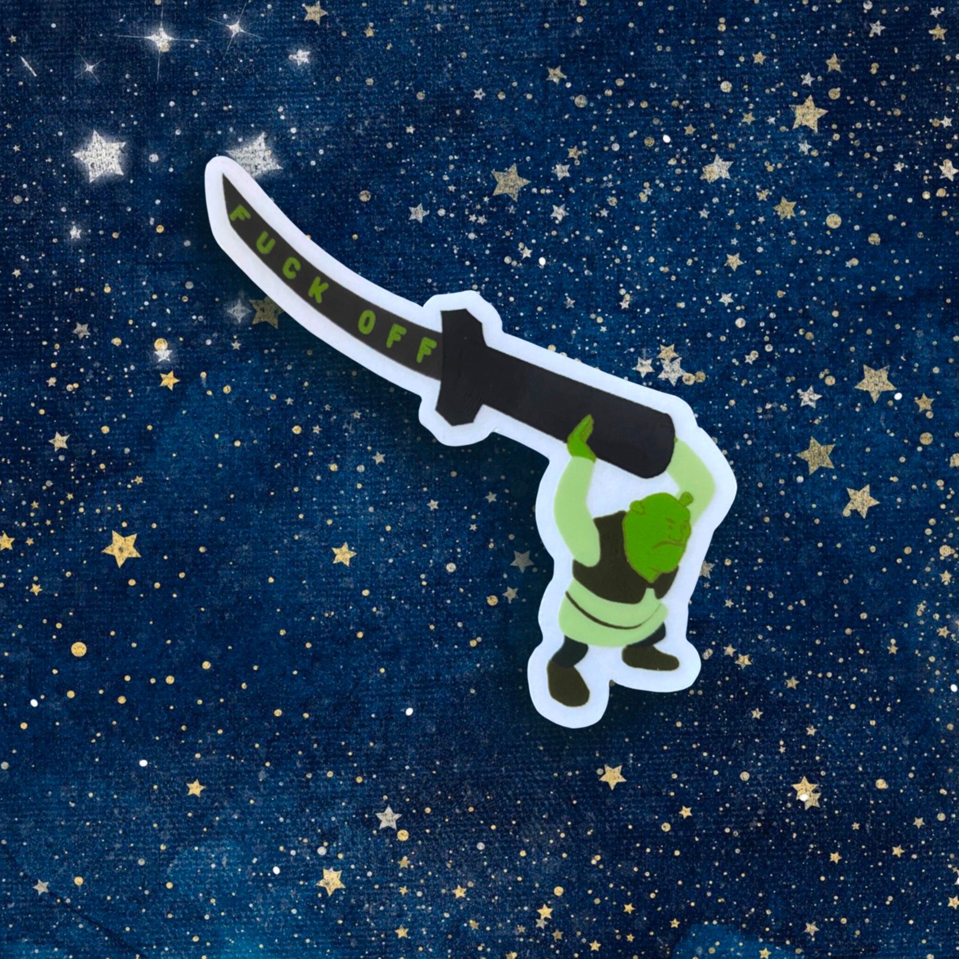vinyl sticker of shrek holding a katana that reads fuck off in green text down the blade
