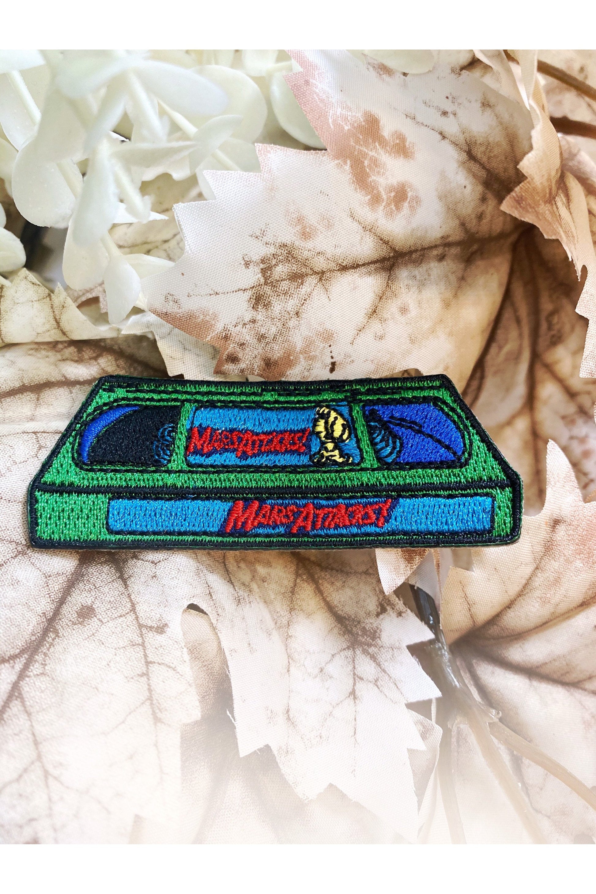 Combo Deal LIMITED RUN Mars Attacks VHS Tape Holographic Sticker + Iron-On Patch *Discounted*.