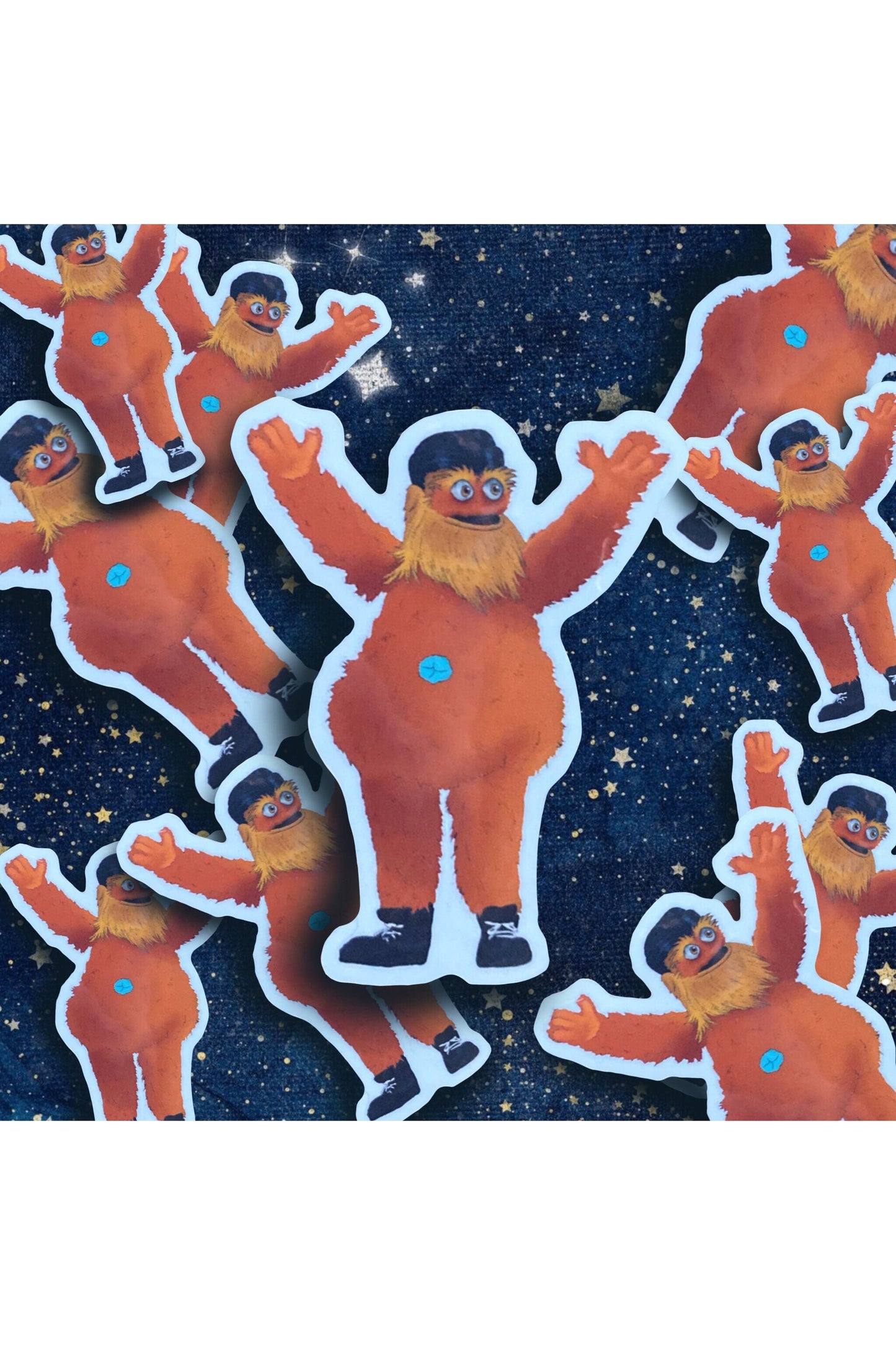 Vinyl stickers of hockey team the flyers mascot gritty. gritty is a large orange furry mascot with googly eyes and an outie belly button. gritty is streaking with only shoes on.