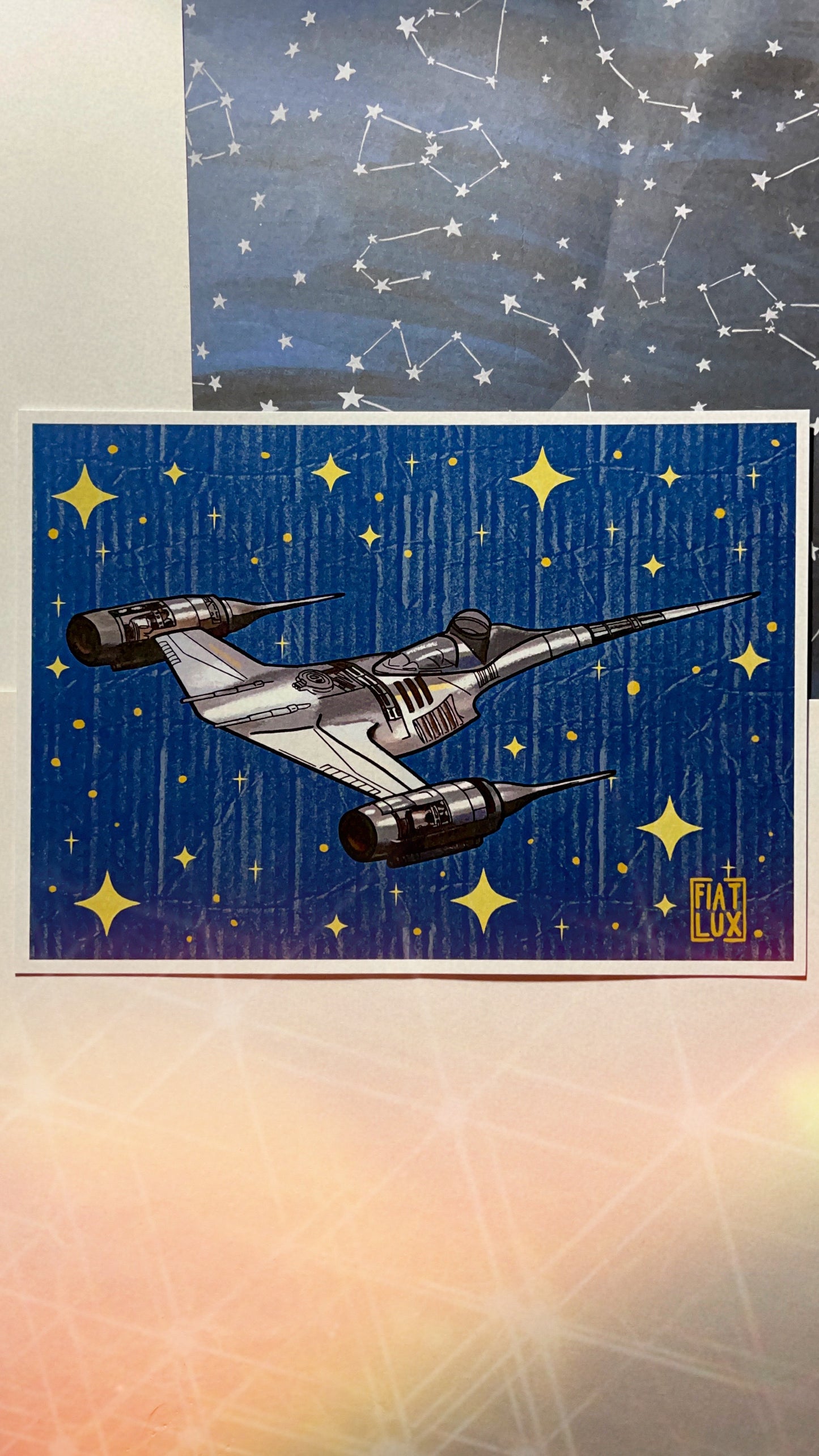 Art Print of Din Djarin Mandalorian silver N1 Starfighter rust color Speeder with a solid blue background with gold stars and a paper texture overlay