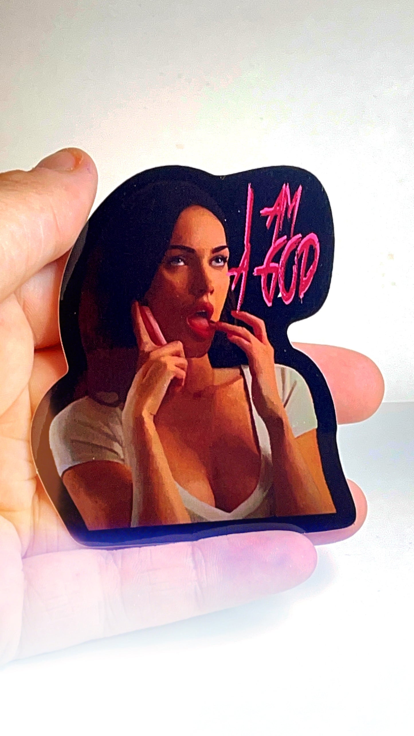 Vinyl sticker of Jennifer Check from Jennifer's Body with the quote I am a god