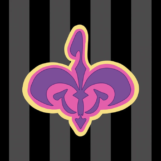 Item is an acrylic keychain of the Naboo royal crest in pink, purple, and yellow. Background is a pink toned sequin fabric.